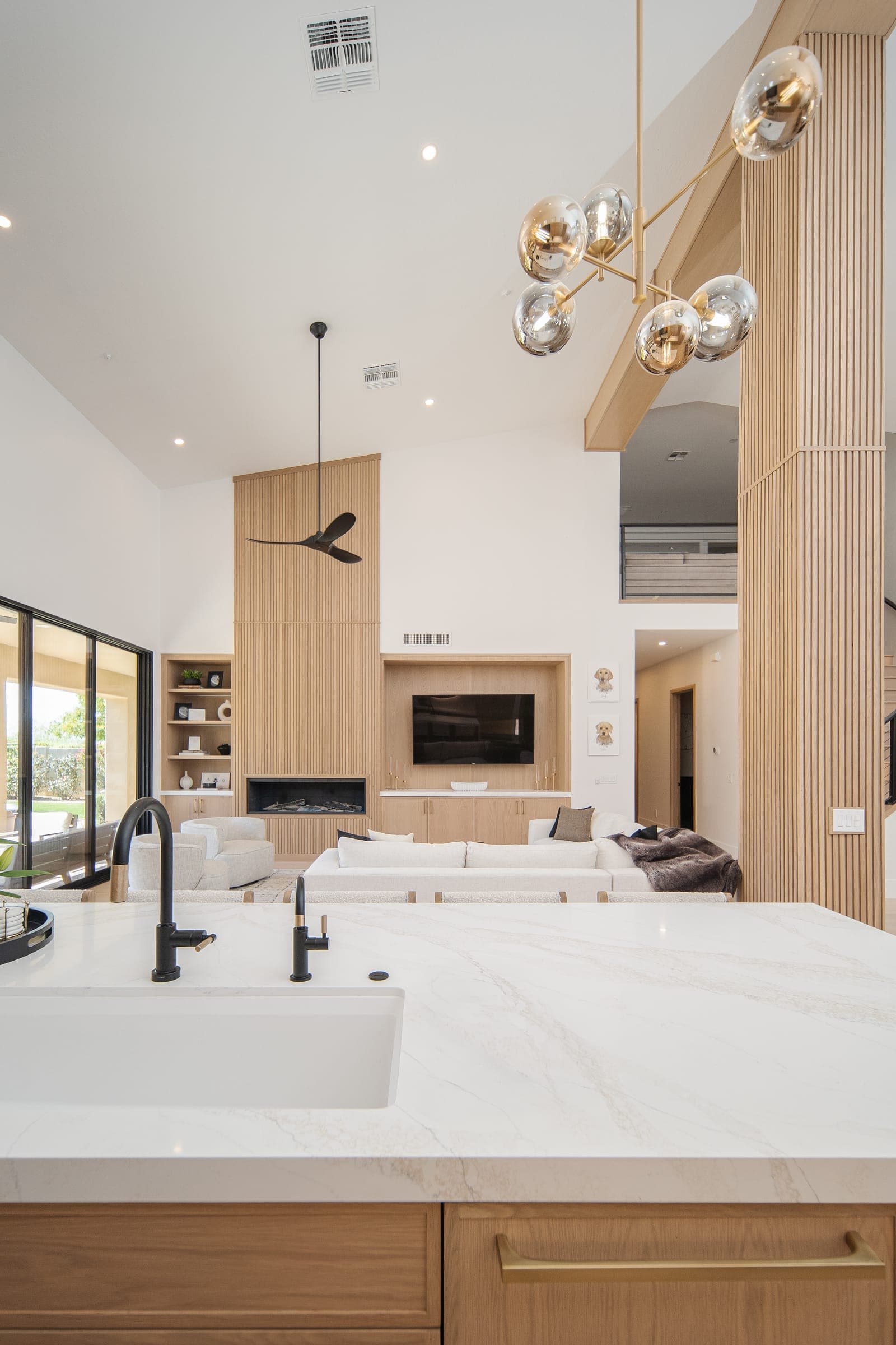 McDowell Mountain Residence — vaulted open-plan kitchen and living room by Studio 1188